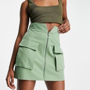 ASOS DESIGN zip through utility mini skirt in green